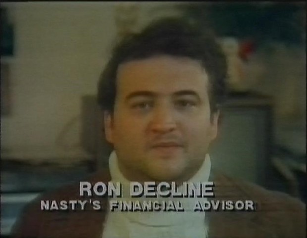 John Belushi as Ron Decline